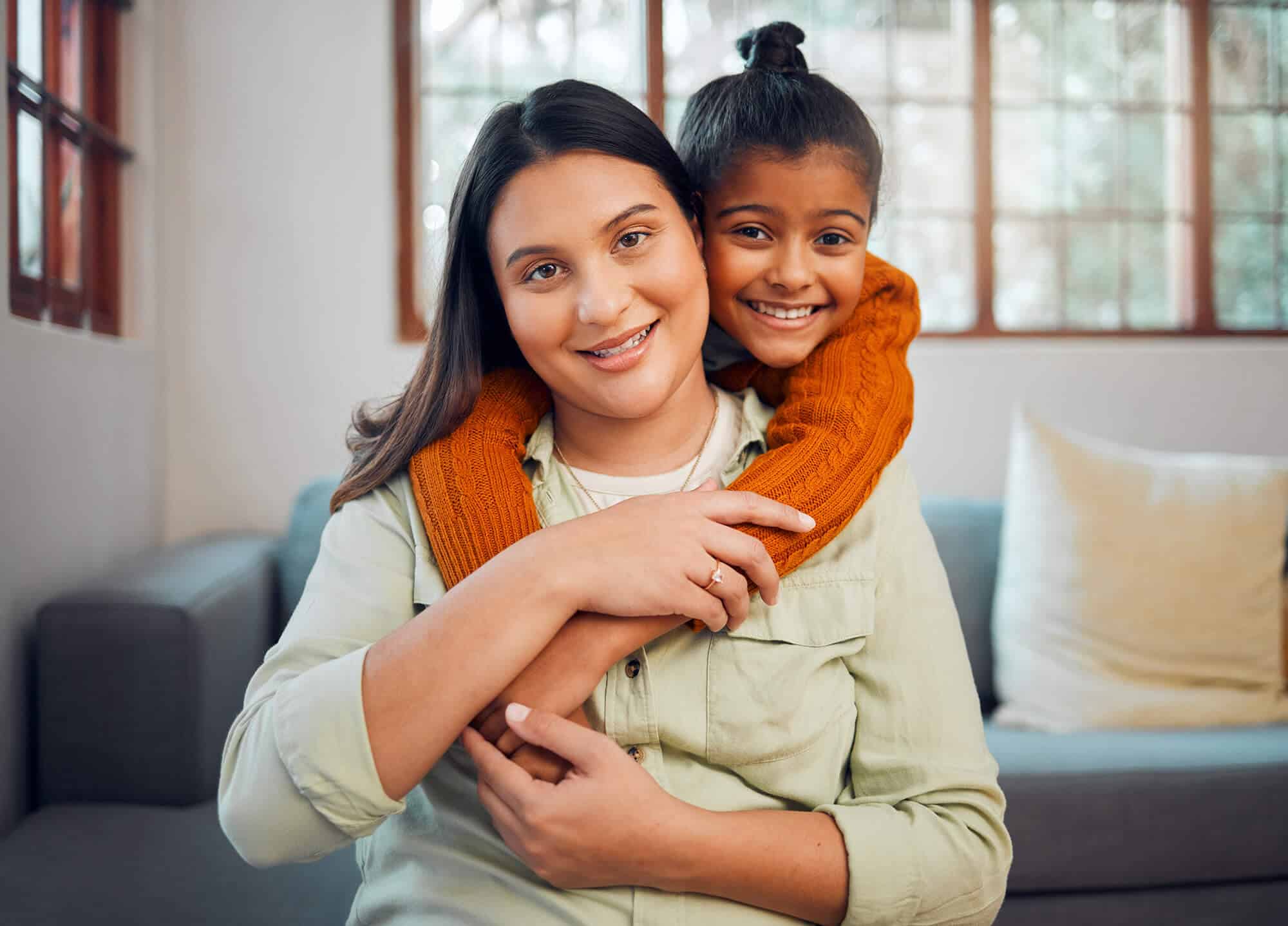 family-portrait-and-mother-with-girl-on-a-sofa-em-2023-11-27-05-06-22-utc.jpg